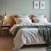 Parure de lit 160 x 200 : comment choisir un ensemble harmonieux et confortable