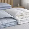 Couette été, couette hiver : le guide que personne ne lit et que tout le monde devrait connaître